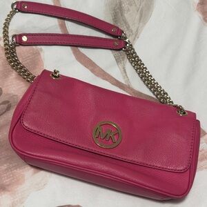 Michael Kors Pink Leather purse with adjustable chain gold tone hardware